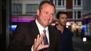 Mike Ashley’s Frasers Group warns of ‘dark clouds’ ahead amid flat profit forecast